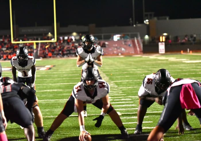 Norman High senior Dax Noles lines up at quarterback during the Tigers' game at Mustang on Oct. 20, 2023.